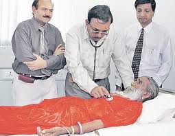 Prahlad Jani, a famous Indian breatharian, here being inspected by a medical team. There has been a long controversy in India over his professed ability to live without food and water for 70 years.